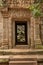 Fallen rocks seen through ruined temple doorway