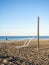 Fallen volleyball net on the beach. The concept of winter at the Black Sea resort. There is no game. The resort is out of season