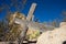 Fallen weathered cross in terlingua abandoned cemetery texas usa