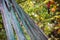 Fallen wooden fence among the trees, soft focus