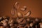 Falling aromatic roasted coffee beans, closeup view