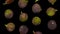 Falling black figs on transparent background looping with alpha channel