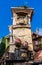 Falling Clock tower of puppet theater Rezo Gabriadze in old town of Tbilisi. Georgia