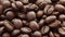 Falling coffee beans closeup