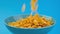 Falling corn flakes, healthy cereal breakfast