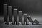 Falling crisis 3d bar chart made in black color over shades of gray