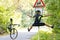 A falling cyclist bumps into a road sign