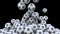 Falling football balls against black background. 3D rendering