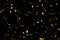 Falling gold glitter foil confetti, on black background, holiday and festive fun