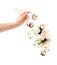 Falling pieces of sushi and sushi roll with wooden chopsticks