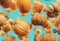 Falling Pumpkin isolated on blue background, selective focus