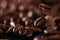 Falling roasted coffee beans background with copy space. Coffee beans in the factory. Coffee beans fall onto the table