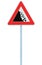 Falling rocks risk caution road sign on pole post, large detailed isolated vertical roadside stones traffic warning signage macro