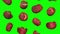 Falling Saturn Peaches on Green Background Looping 01A