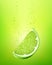 Falling slice lime fruit into water. 3d realistic vector illustration. Packaging design elements. Juicy advertising cut citrus.