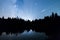 Falling stars Lake pine trees silhouette Milky Way