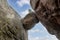 Falling stone between two rocks