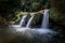Falling water and an enchanting waterfall named \\\'Schiessentumpel\\\' between the solid rocks
