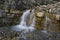 Falls among mountains in flysch rocks. Carpathians. Ukraine