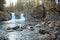 Falls on a stream in northern wood