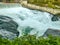 Falls and the Washington Water Power building along the Spokane