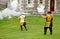 Falmouth, Cornwall, UK - April 12 2018: Historical military re-enactors dressed in blue and yellow Tudor clothes firing genuine 1
