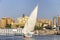Faluca boat sailing in Nile river at sunset