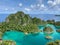 Fam Islands, Piaynemo, Raja Ampat, West Papua, Indonesia. Blue lagoon, green Islets, tropical paradise