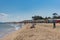 Families with children enjoing summer day on Brighton beach in Melbourne