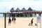 Families have fun at the beach of Busselton Jetty, Western Australia