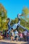 Families near the wild geese slides at the Gathering Place public park in Oklahoma on warm sunny early autumn