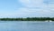Families swimming, boating and enjoying life on a beautiful Minnesota lake.