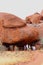 Families visit a cave in Uluru Ayers Rock, Australia