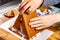 Familiy building a sweet ginger bread house