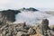 Family adventurers with baby on the top of mountain