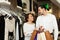 Family with bags at clothing store