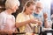 Family baking apple pie