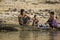 Family bathing in the river