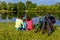 Family bike ride outdoors, active parents and kid cycling