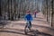 Family on bike ride in spring, mother and son exercise in nature