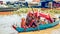 Family on a boat in a floating village on Tonle Sap lake