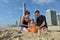 Family builds sand castle in Surfers Paradise Australia