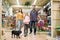 Family buying supplies for puppy in pet shop