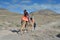 family camel ride in the beautiful landscapes of the desert