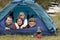 Family camping in tent