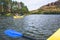 Family in canoe doing an outdoor water sport in a river healthy lifestyle