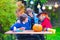 Family carving pumpkin at Halloween