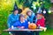 Family carving pumpkin at Halloween