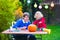 Family carving pumpkin at Halloween