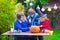 Family carving pumpkin at Halloween